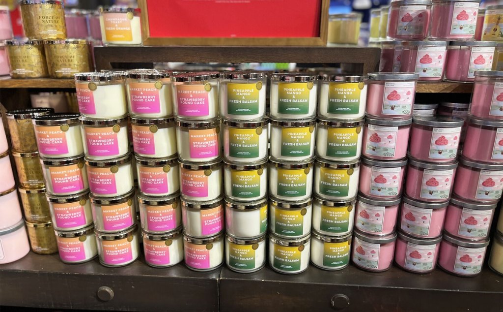 display of bath & body works 3 wick candles