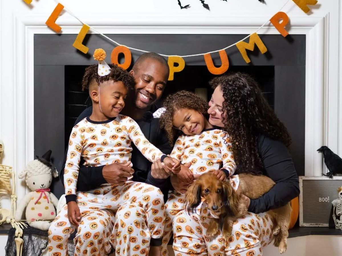 family wearing matching Halloween pajamas