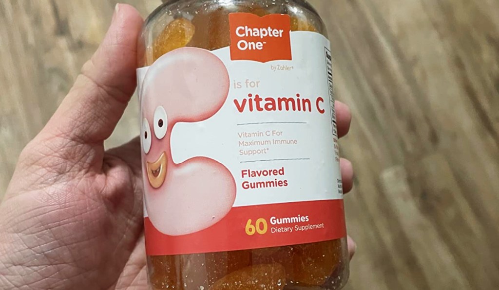 hand holding bottle of vitamin c gummies
