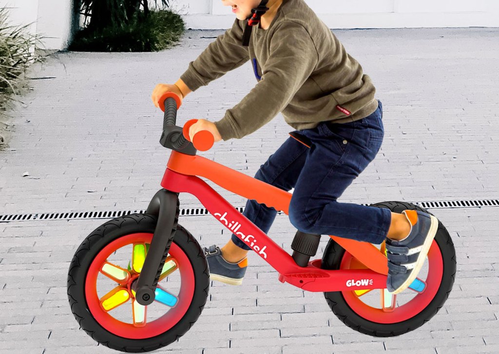 boy on red bike