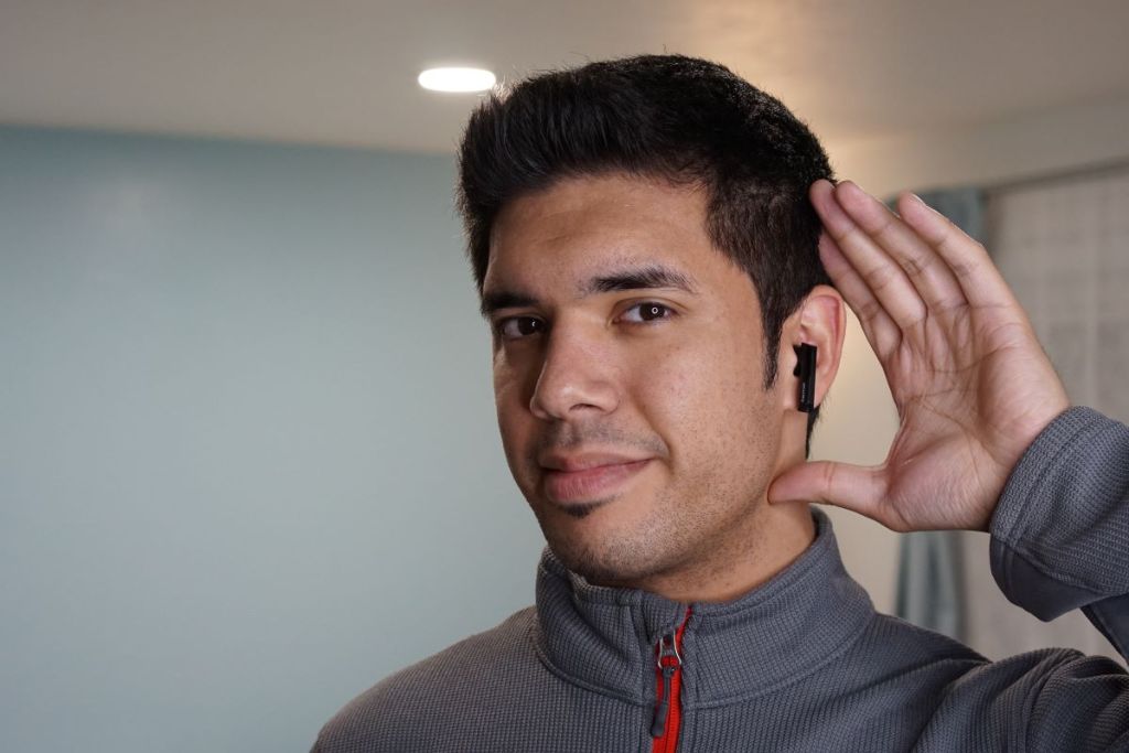 man wearing Edifier x6 earbuds