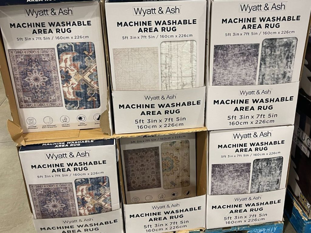 boxes of Wyatt & Ash machine washable rugs at Costco