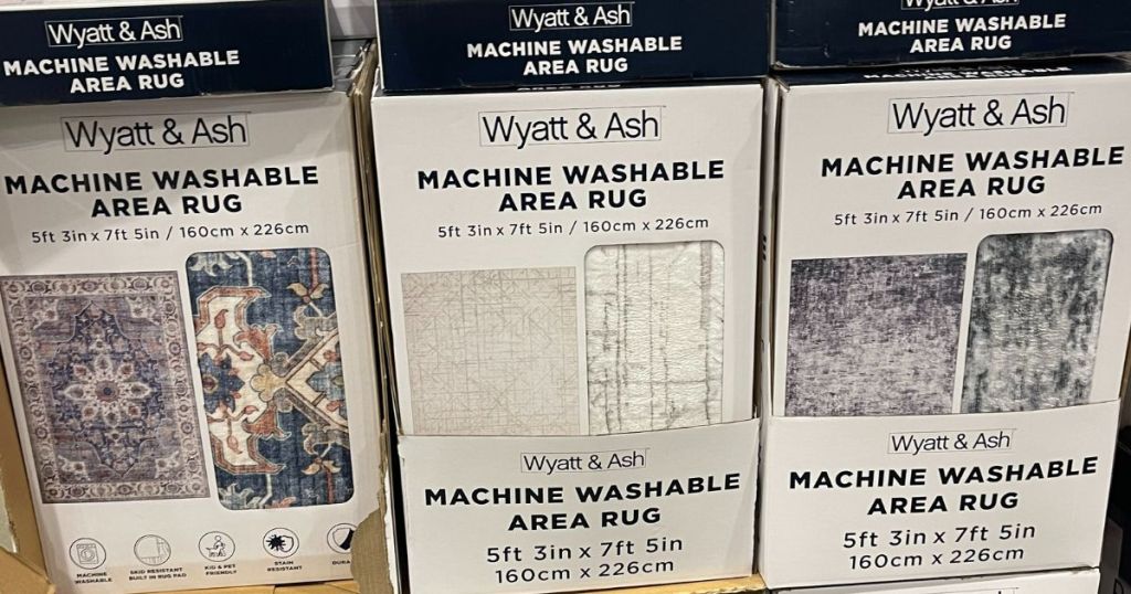 boxes of Wyatt & Ash machine washable rugs at Costco