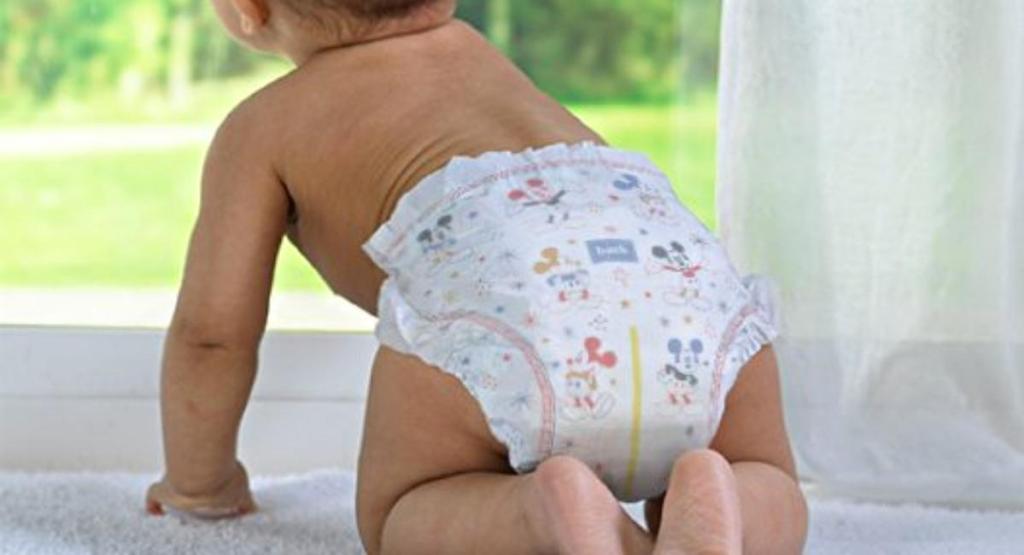 baby wearing huggies diaper