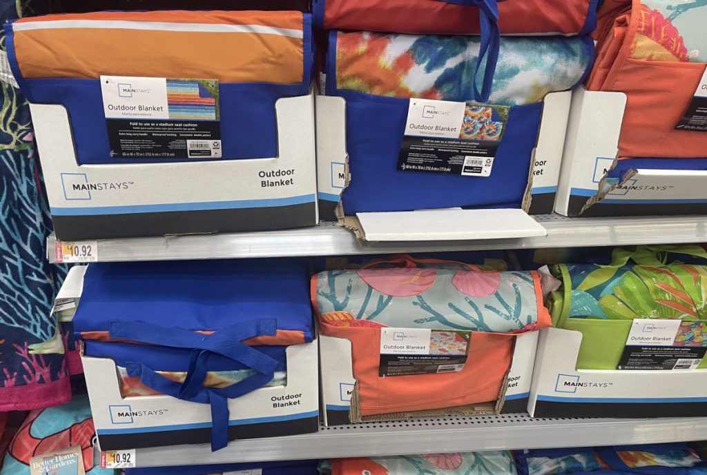foldable outdoor blankets on store shelf