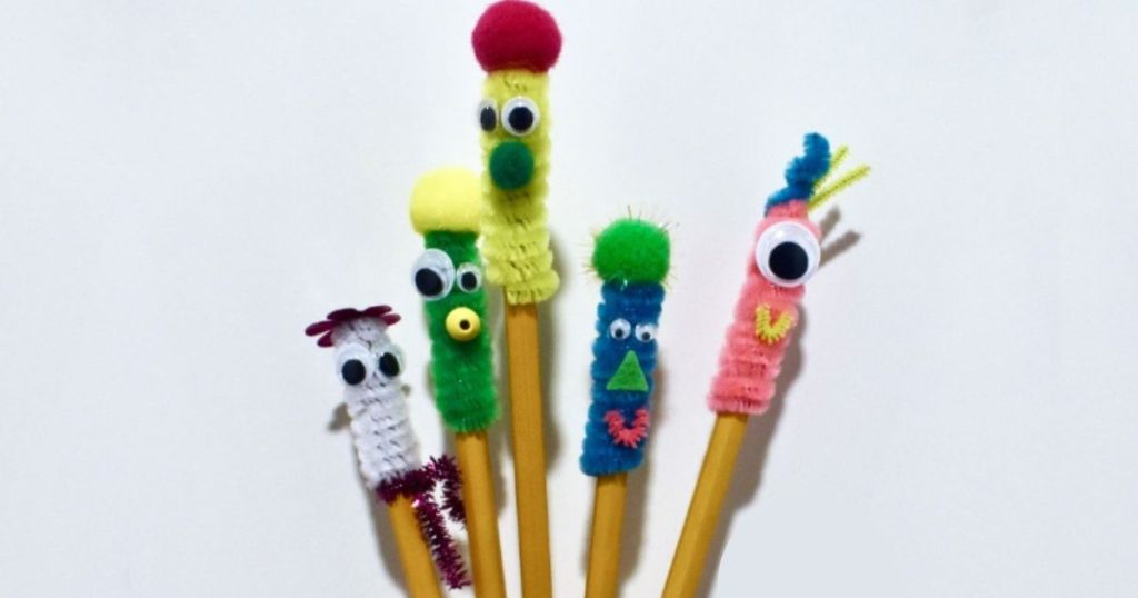 pencils with pipe cleaner animals on top