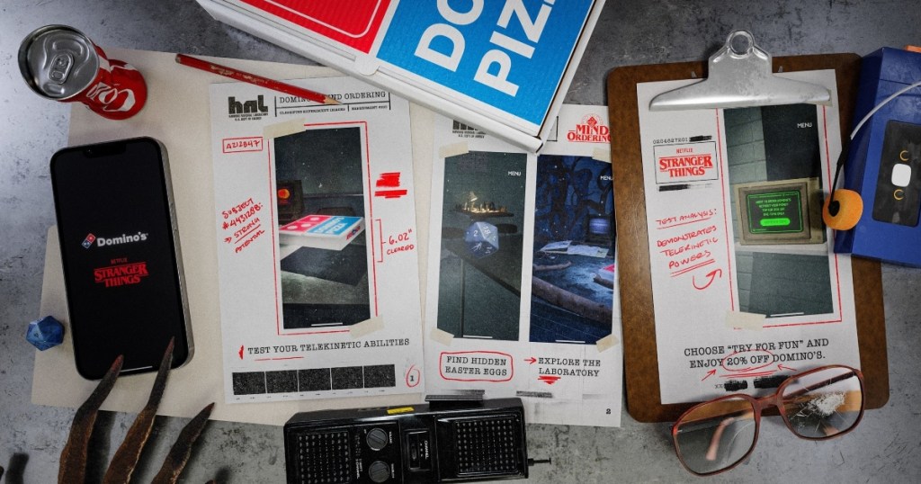 Stranger Things memorabilia with Dominos pizza box