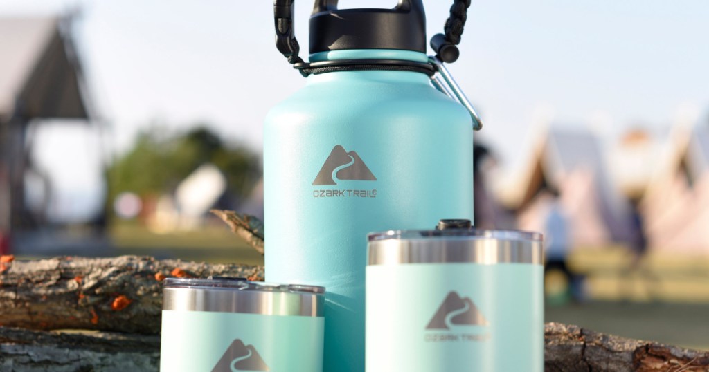 light blue bottle and two tumbler cups