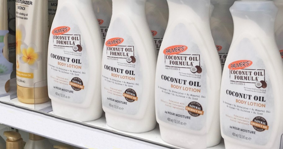 white bottles of Palmer's Coconut Oil Body Lotion on store shelf