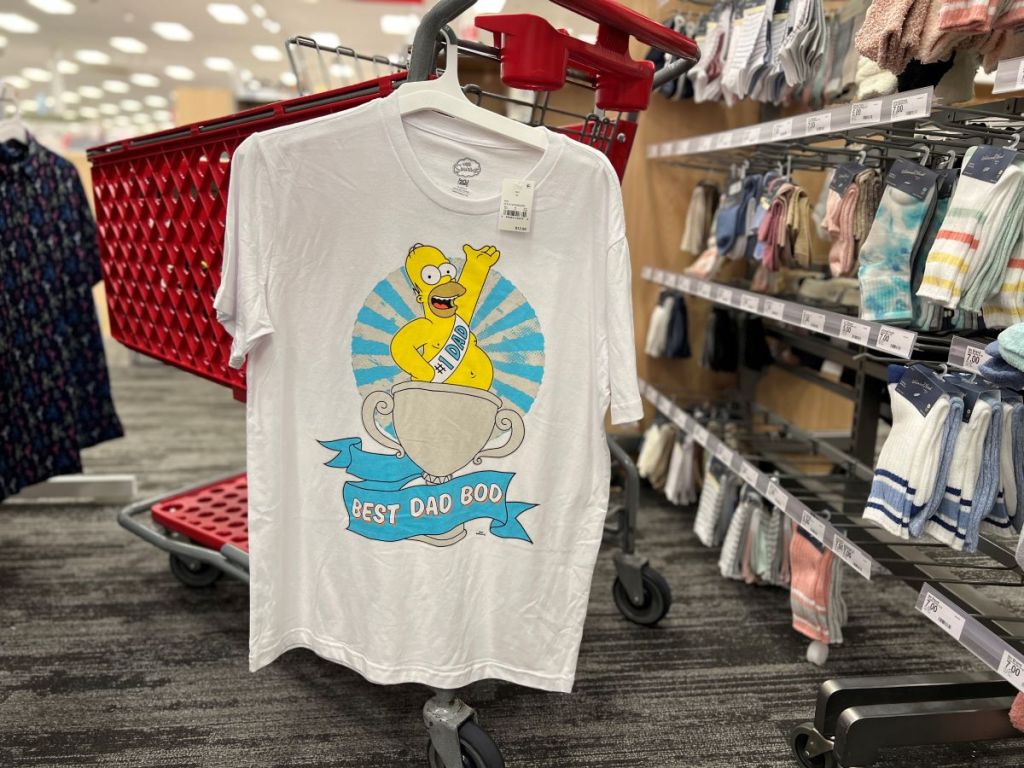 T-shirt hanging on a cart with Homer Simpson on it