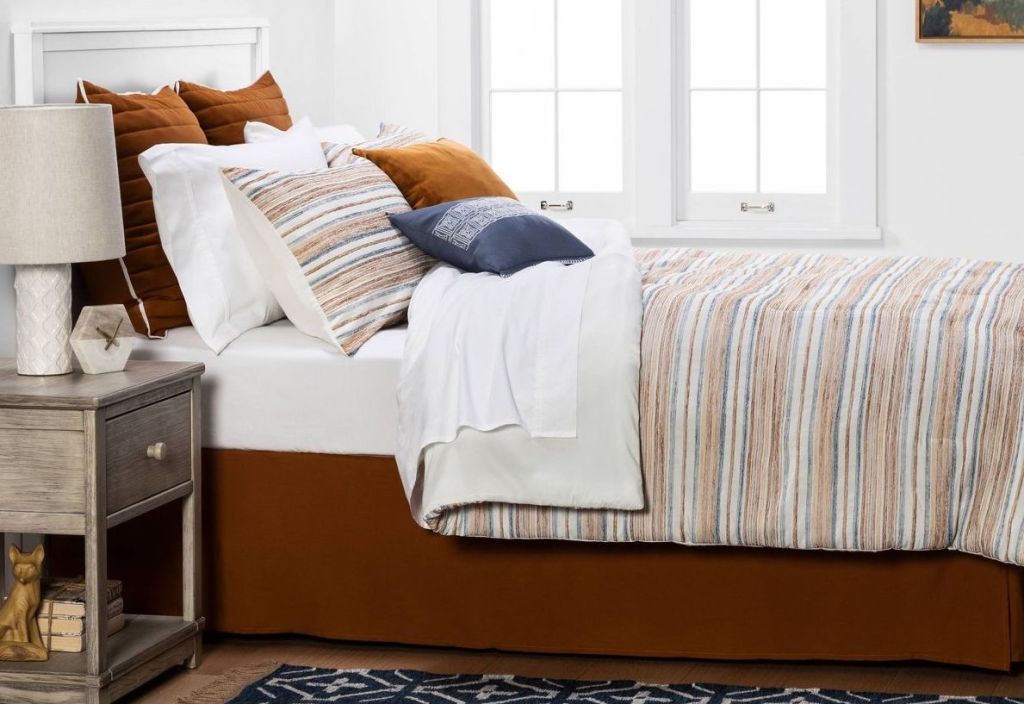striped bedding set on a bed
