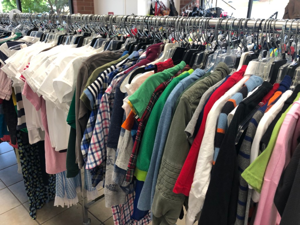 a rack of thrift store clothing like the one at the savers near me