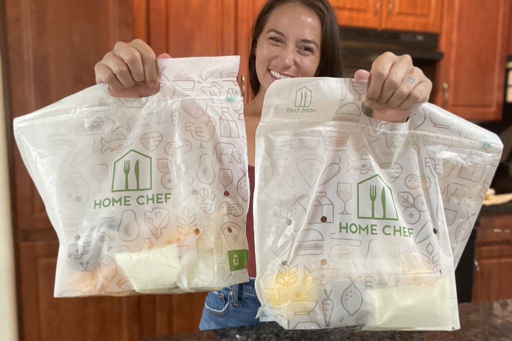 Woman holding Home Chef Bags