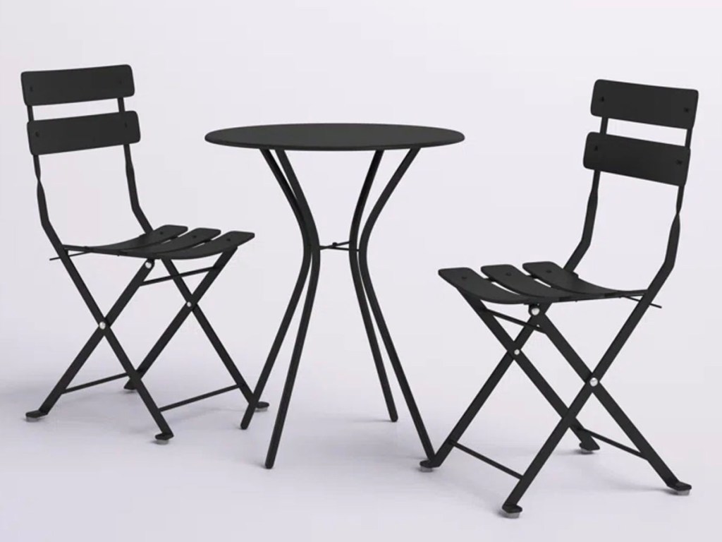 black bistro set with two chairs and table
