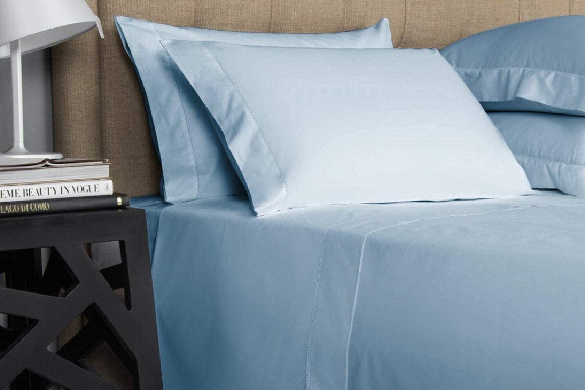 blue sheets on bed