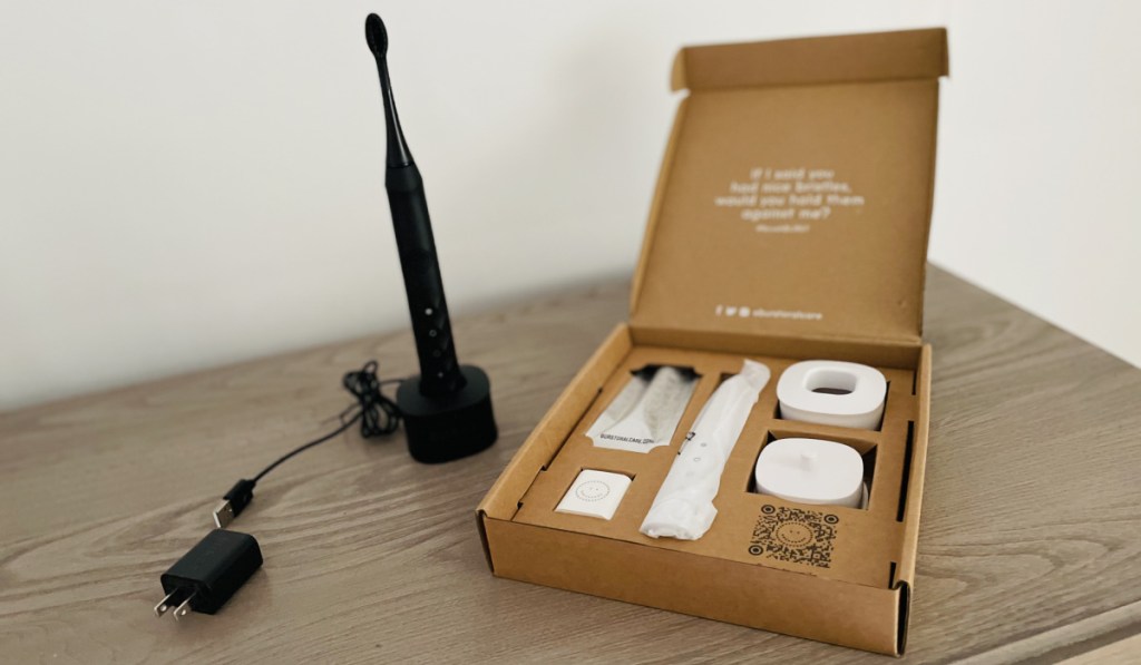 toothbrush + accessories in box