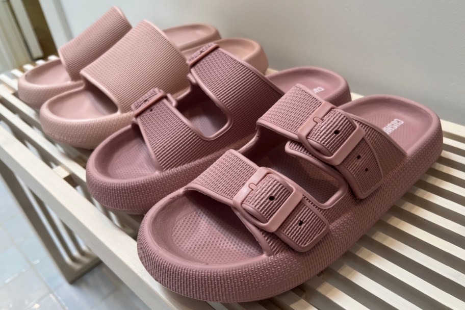 two pairs of pink slides