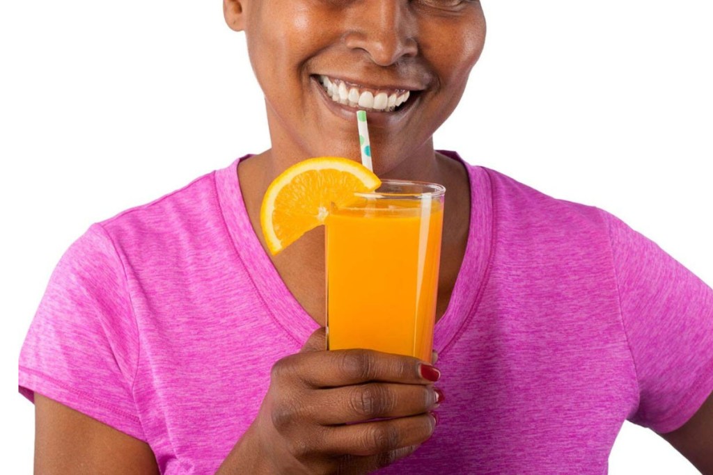 woman drinking juice