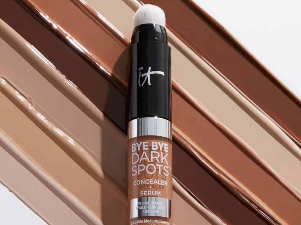 it Cosmetics concealer with lines of concealer behind it