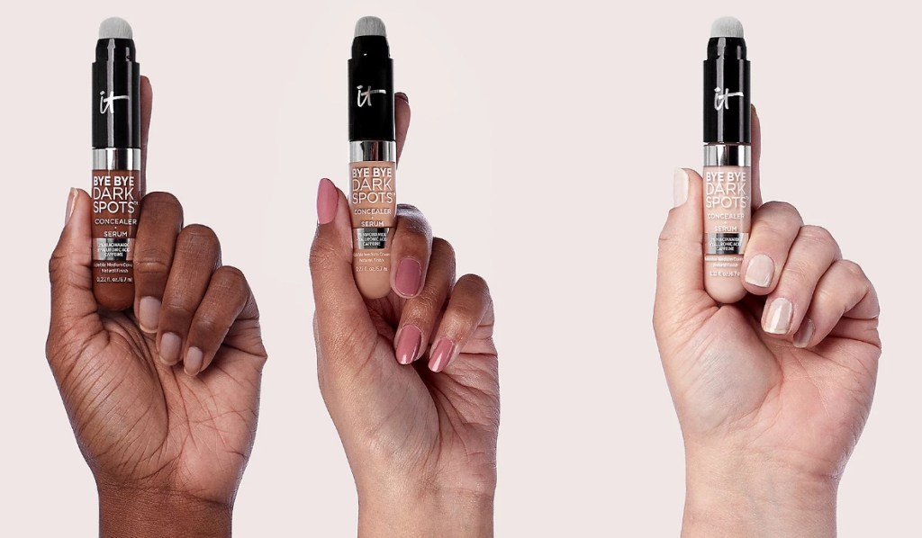 three hands cholding it Cosmetics concealers