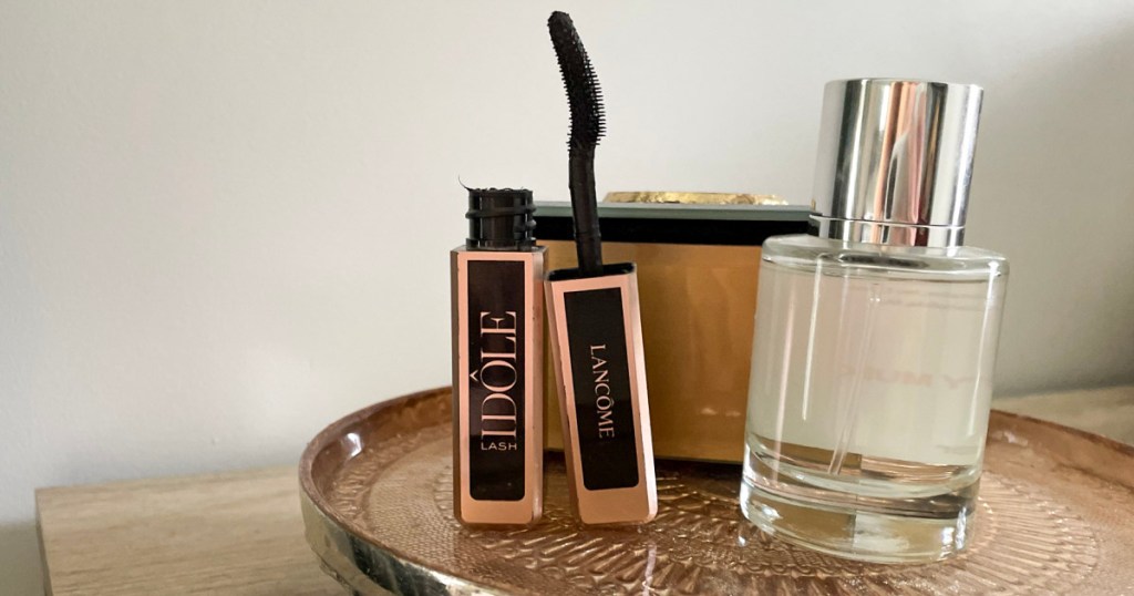 lancome mascara on table with perfume