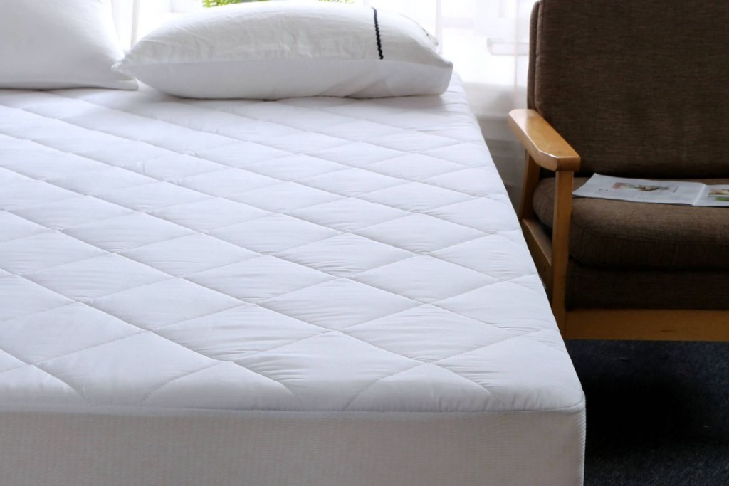 white quilted mattress pad