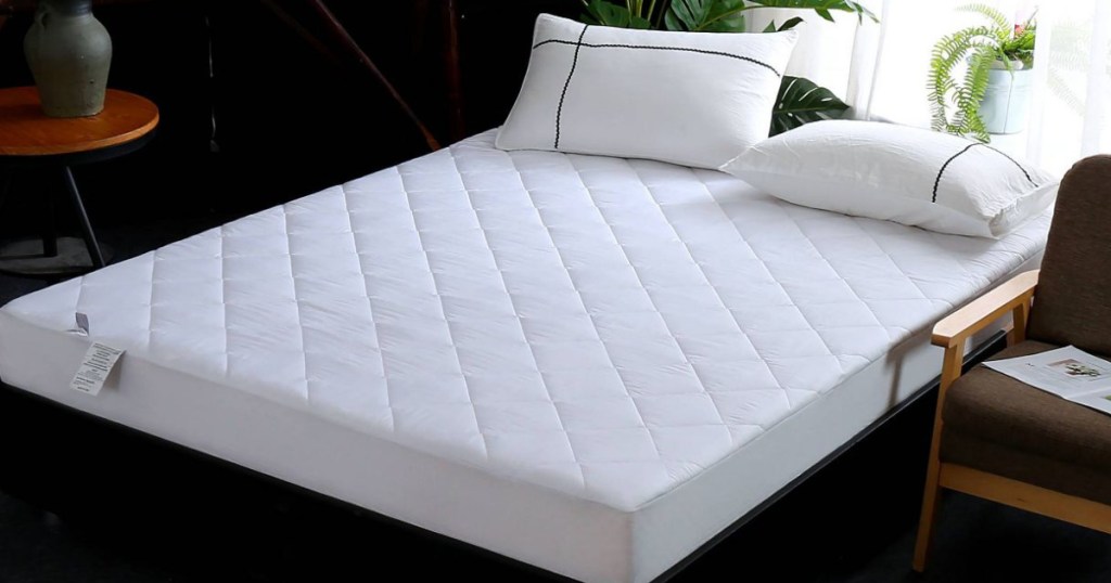white quilted mattress pad