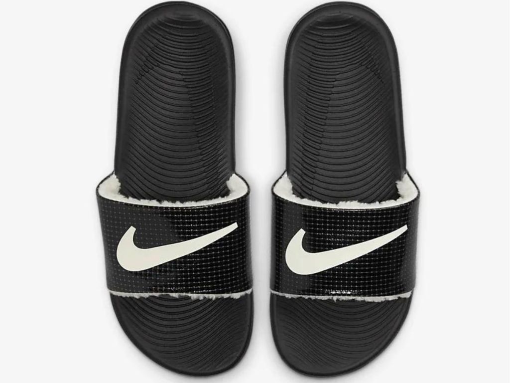 black and white Nike slides