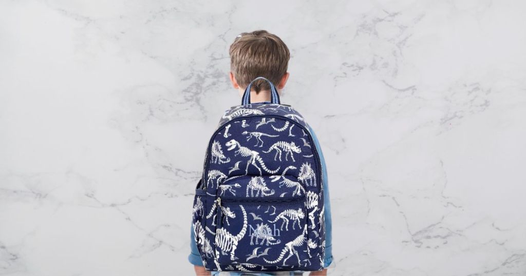 boy with dino bones backpack