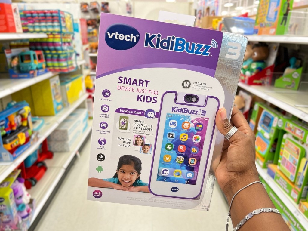 holding Vtech Kidi Buzz 3 children's phone