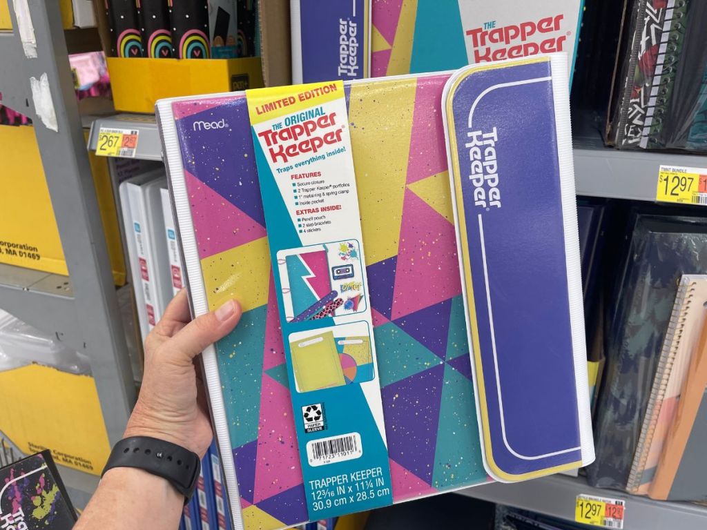 Retro style design Trapper Keeper in woman's hand at Walmart