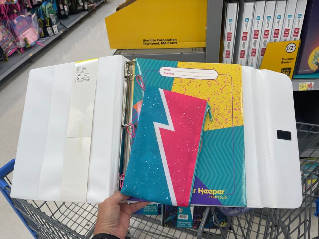 Retro style design Trapper Keeper in woman's hand at Walmart