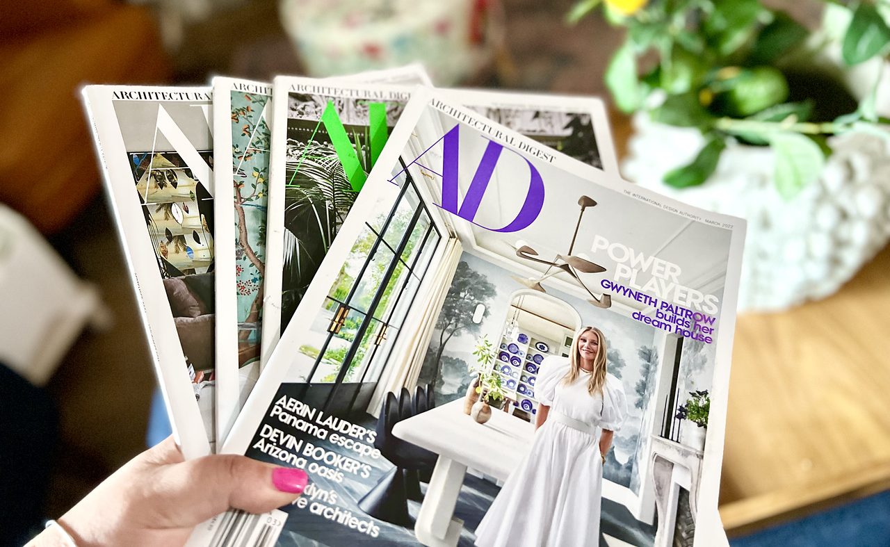 Architectural Digest Stack of magazines in hand