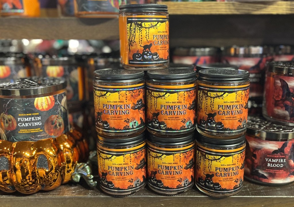 shelf of halloween scented bath & body works candles
