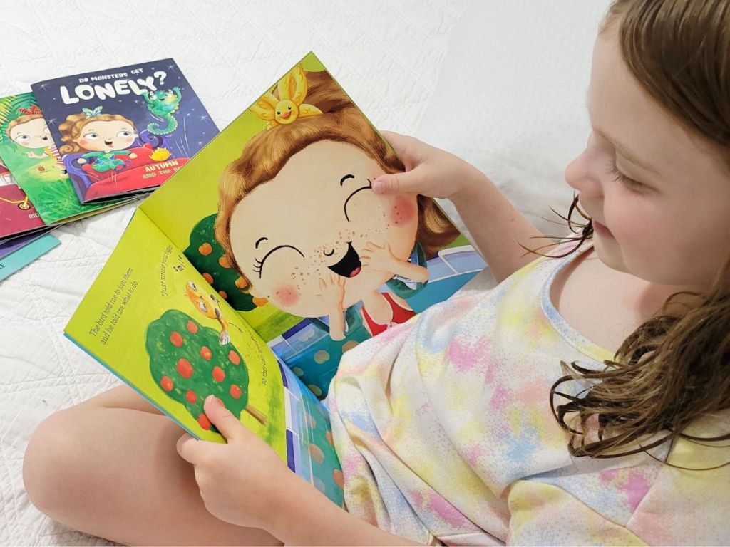 girl reading a Beans & Sparks book