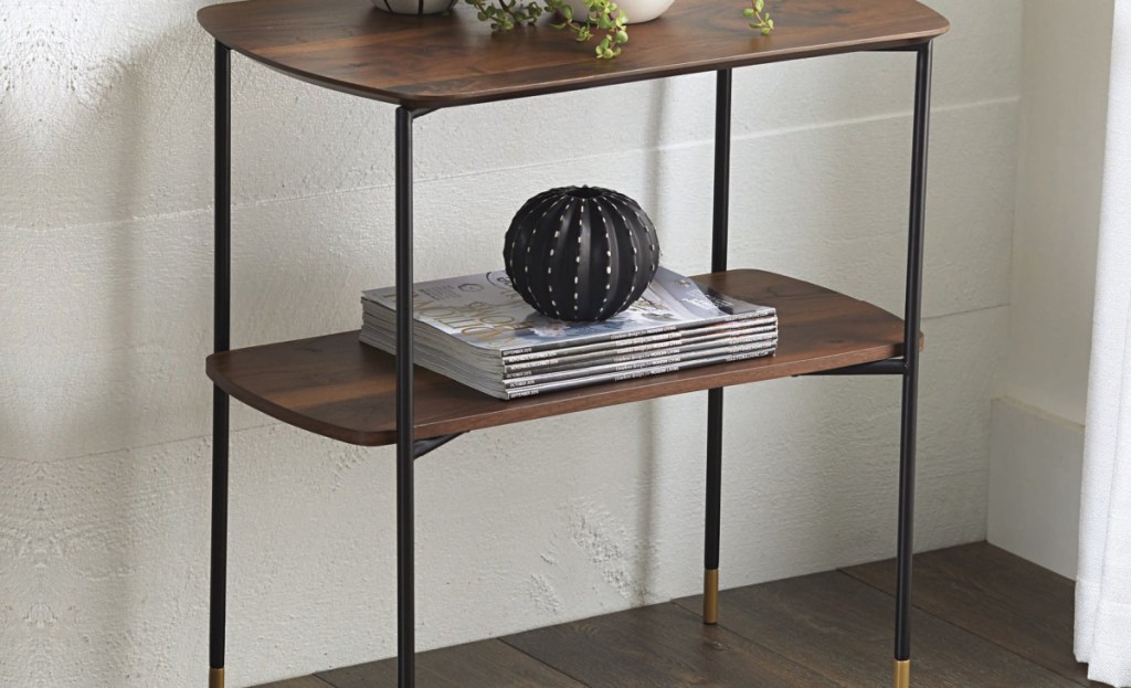 wood and black console table in home