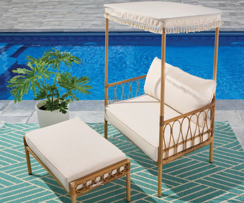 canopy chair and ottoman by pool
