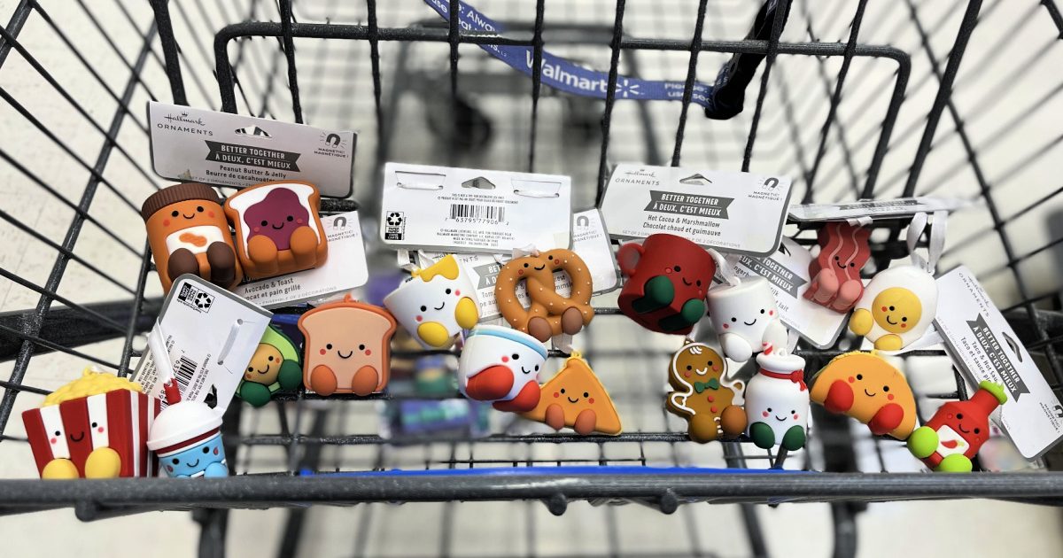 various Better Together Hallmark Christmas Ornaments in a Walmart shopping cart