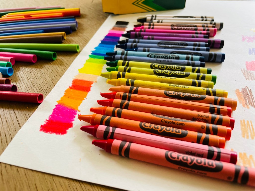 Crayola Crayons laying on paper