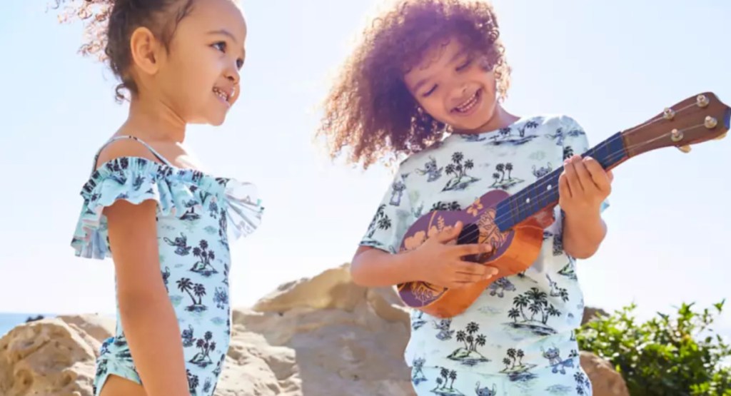 Disney kids at the beach playing instruments