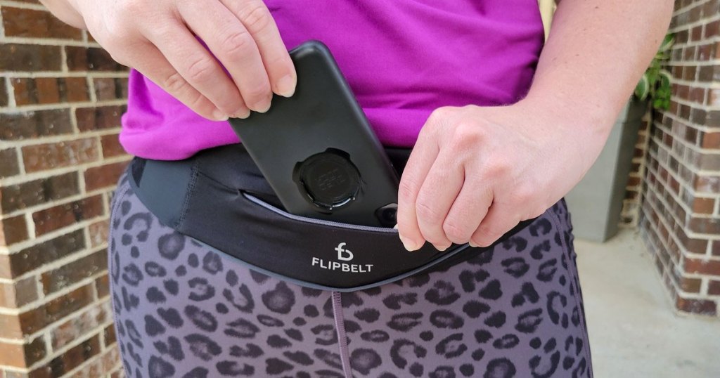 sticking phone into running belt