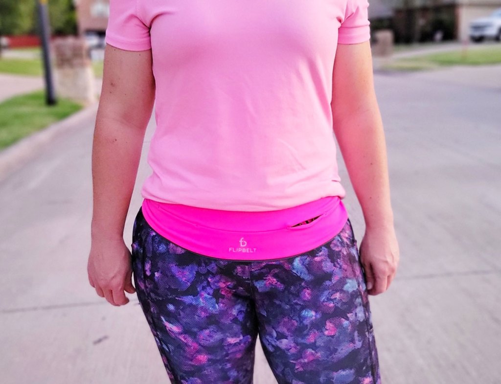 woman wearing pink running belt