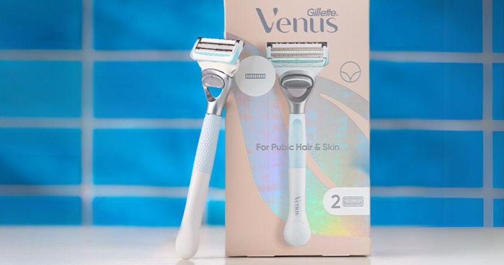 Gillette Venus Intimate Grooming Razors for Women razor leaning against box with a blue tile background