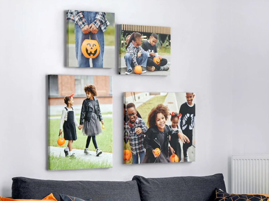 Halloween Canvases hung on Wall above grey couch