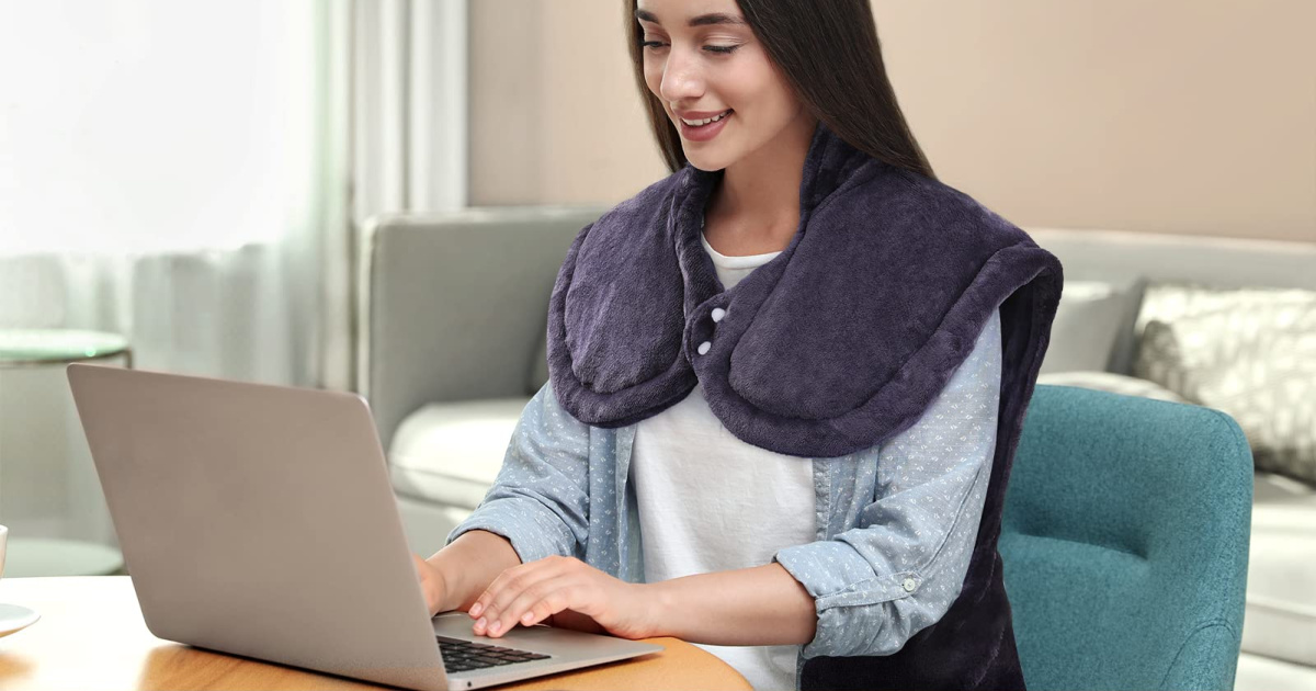 Woman wearing Heating Pad for Neck and Shoulders