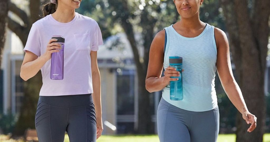 Two women walking outdoors carrying Contigo Water Bottles