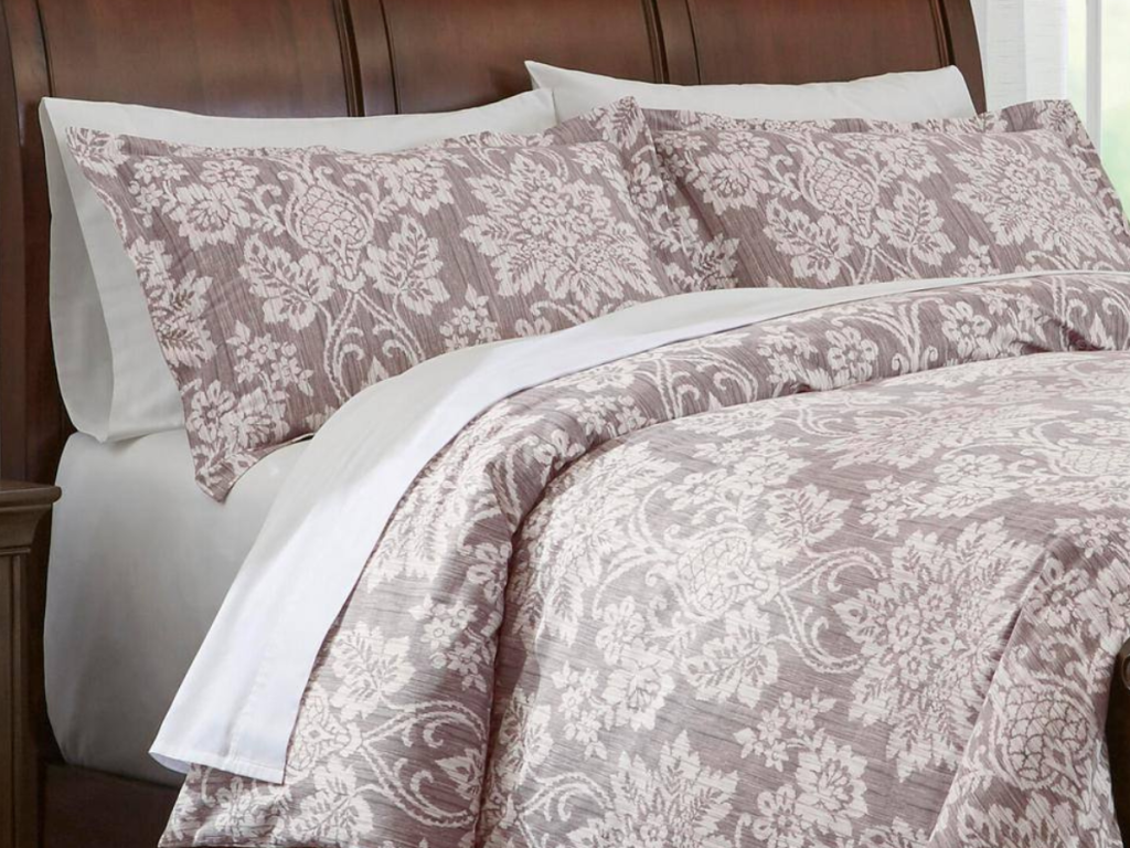light brown damask brown patterned comforter on bed