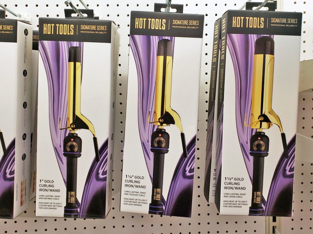 hot tools curing wands on store display wall
