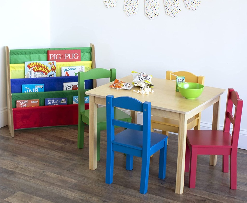 Kids bookshelf by a kids table and chairs