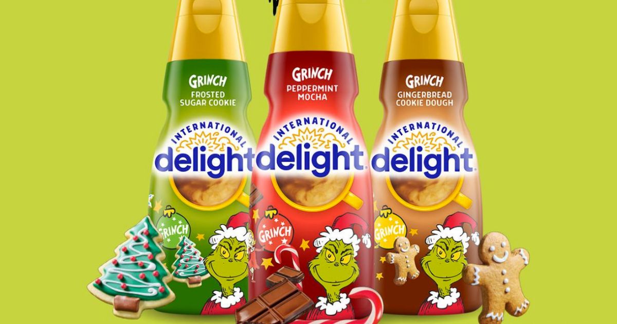 stock image showing three bottles of international delight grinch coffee creamer